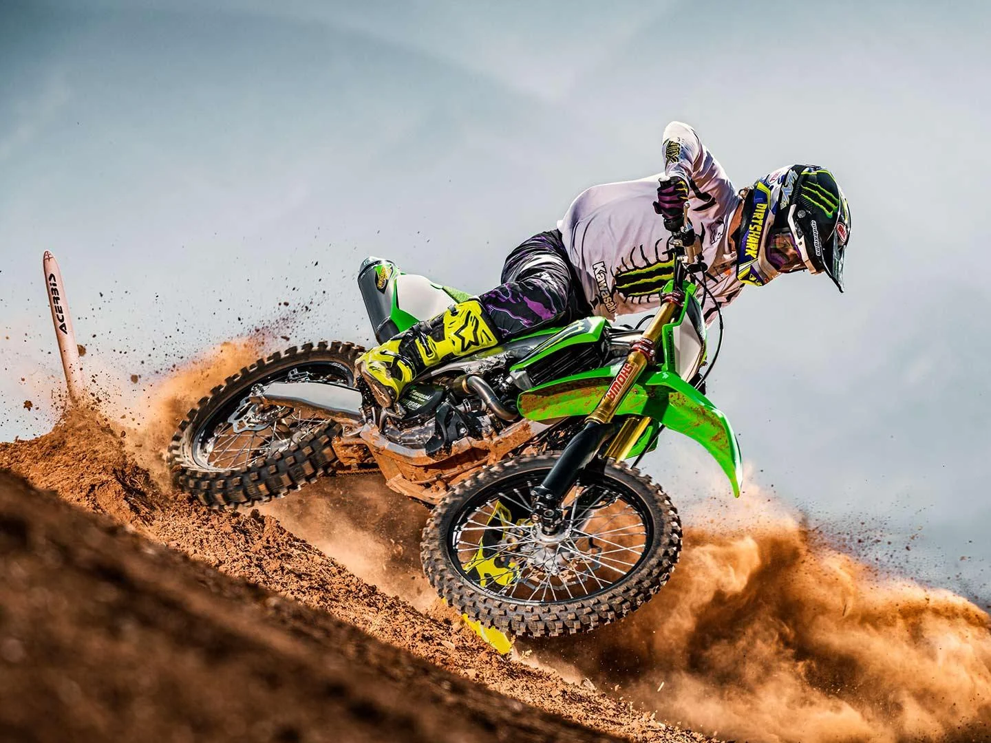 Motocross rider leaning into an off-road turn